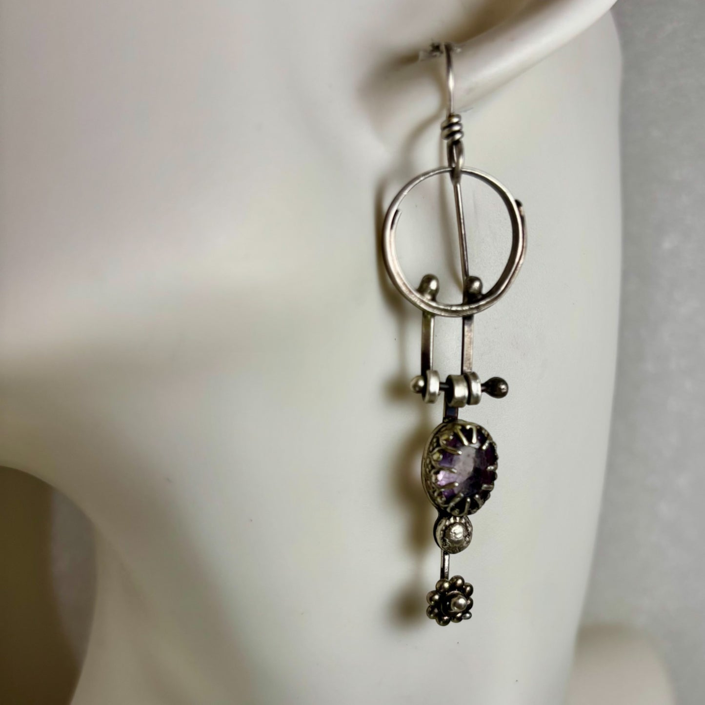 Swinging amethyst dangles
