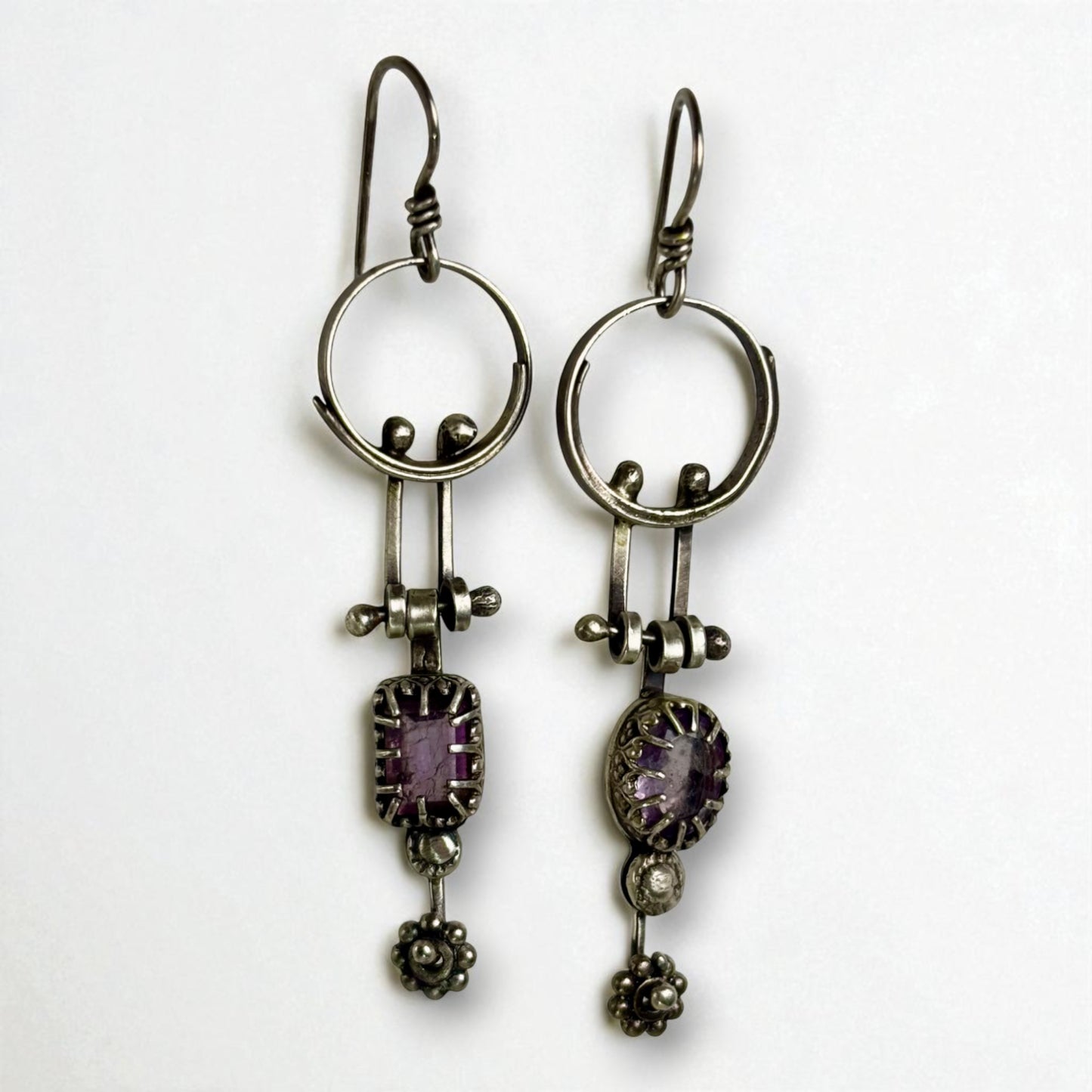 Swinging amethyst dangles