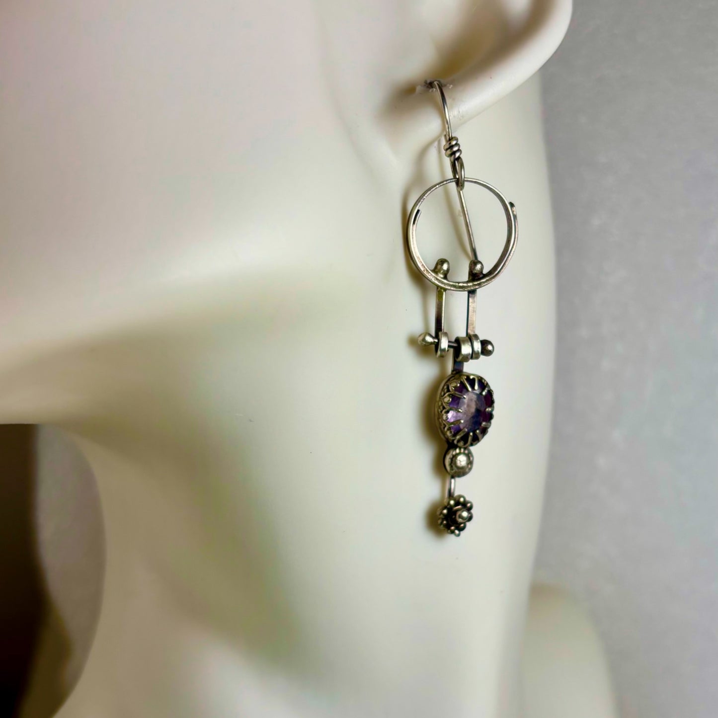 Swinging amethyst dangles
